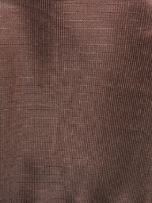 Luxurious velvet-textured linen blackout curtains in warm tones, softly draped to create a cocoon of darkness, ideal for serene bedrooms and cozy living spaces.