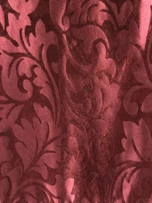 Velvet Obsidian Damask curtain with intricate floral pattern, draped elegantly in a luxurious, dimly lit room, exuding opulence and timeless sophistication.